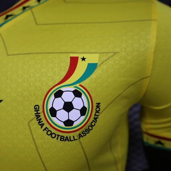 Close-up of the Ghana Football Association logo on the GHANA 2026 AWAY jersey, featuring unique design elements. Ghana 2026 away match.