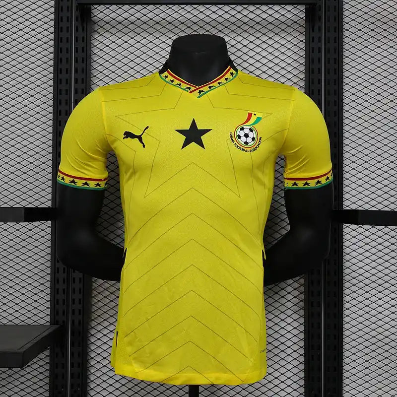 Ghana 2026 away match jersey displayed on a mannequin, featuring a yellow design and black star emblem.