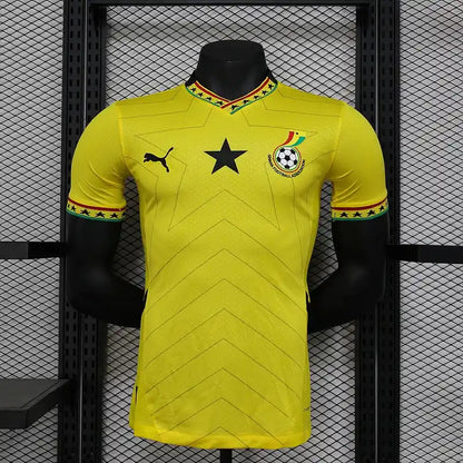 Ghana 2026 away match jersey displayed on a mannequin, featuring a yellow design and black star emblem.