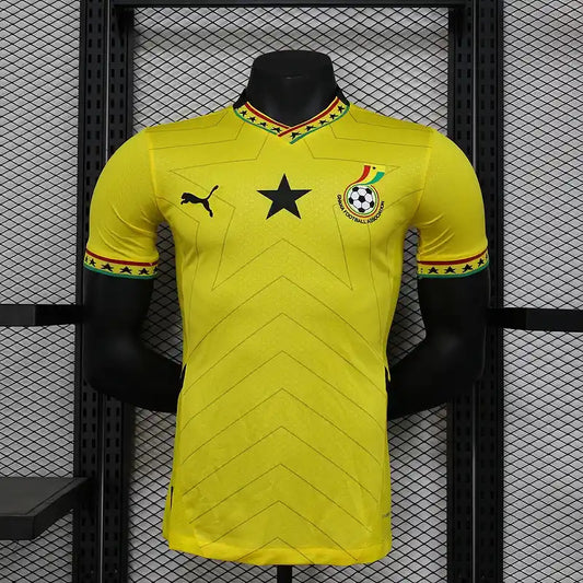 Ghana 2026 away match jersey displayed on a mannequin, featuring a yellow design and black star emblem.