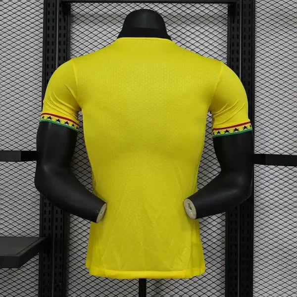 Ghana 2026 away match jersey viewed from the back, featuring vibrant yellow color and colorful accents.